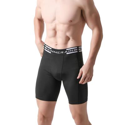 China QUICK DRY Men's Compression Workout Shorts With Phone Pockets Athletic Underwear For Running for sale