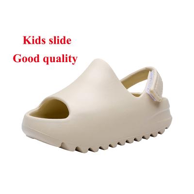 China Lightweight high quality yeezy kids slide slippers summer beach kids indoor colorful unisex sandals for sale