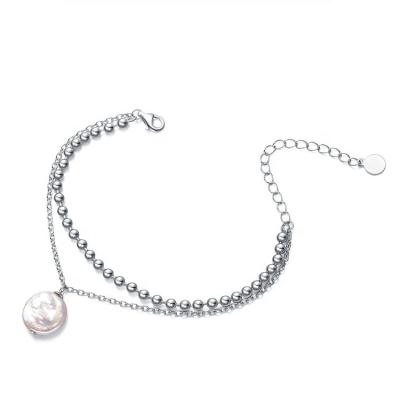 China Claw Setting Top Selling Fashion Jewelry Luxury Silver Double Chain Bracelet With Flat Pearl for sale