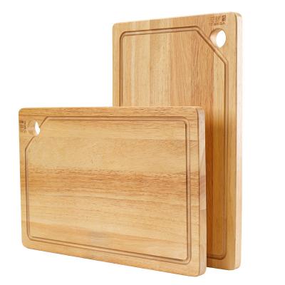 China Kitchen Viable Wooden Cutting Board With Juice Groove Have Hanging Hole Serving Board Rubber Wood Cutting Plates for sale