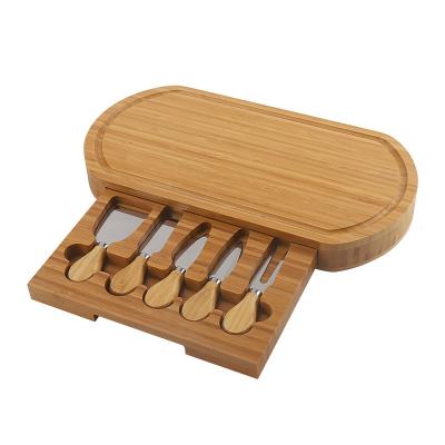 China Viable Bamboo Cheese Board and Knife Set Serving Set Tray Slide Out Drawer Cheese Cutting Board Charcuterie Cutlery Knife for sale