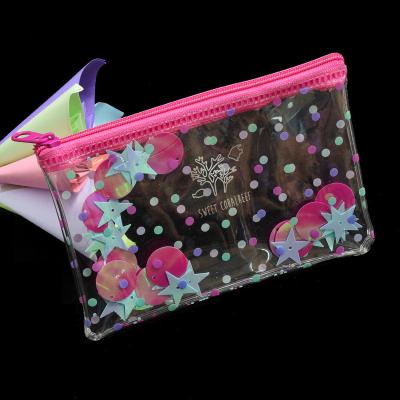 China Cute Transparent Waterproof Glitter PVC Stars High Quality Glitter Cosmetic Bag School Bag for sale