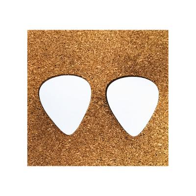 China Sublimation blank hot sale aluminum guitar picks music metal scraping guitar tags blank sublimation guitar picks 28X32MM for sale