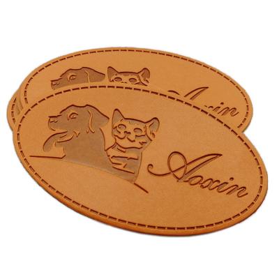 China Handmade Custom Leather Garment Label Embossed Logo PU Leather Patch For Jeans Hat for sale