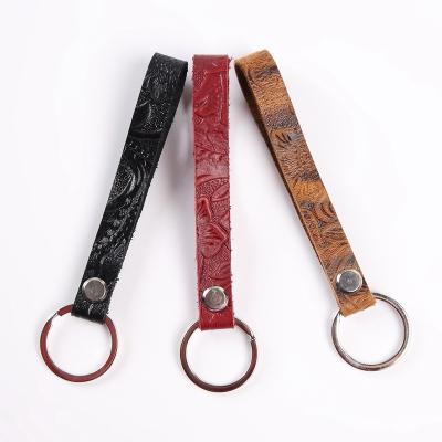 China Innovative Gifts Promotion Gifts Key Chain Engraving Carved Pattern Bracelet Leather Key Chain for sale