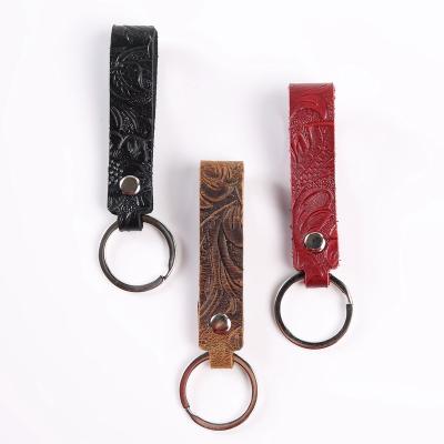 China Wholesale Gifts Handmade Embossed Leather Genuine Leather Key Chain With Metal Key Ring for sale