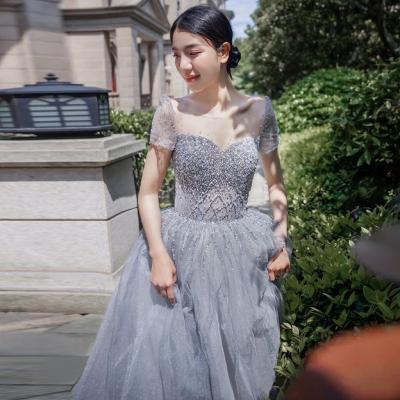 China 2022 Anti-Static A Line Blue Cocktail Dresses Beadings Illusion Zipper Tulle O Neck Sequined Charm Evening Dresses For Wedding New for sale