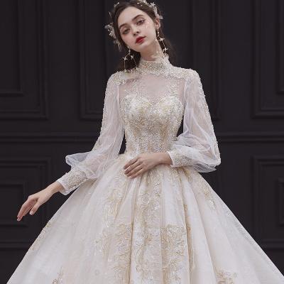 China Luxury Anti-Static Wedding Dress Ball Gown Lace Long Sleeves High Neck Beading Shiny Beading Arabic Princess Bridal Gowns New Muslim Court for sale