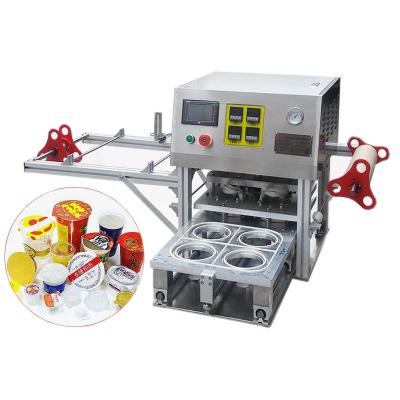 China Food Milk mill tea beverages Automatic small cup sealing machine Plastic cup mask jelly cup sauce automatic sealer machine stainless for sale