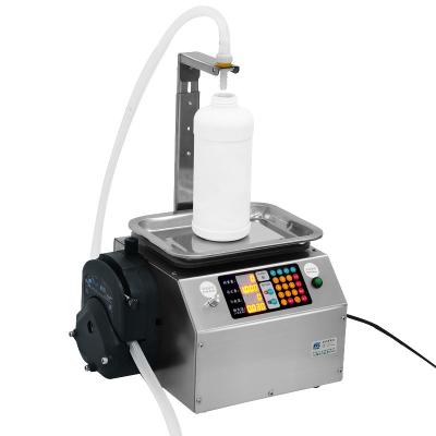 China Food Automatic weighing and quantifying glue and Glue oil toothpaste liquid dispensing peristaltic pump filling machine for sale