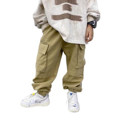 China Anti-Wrinkle Kids Loose Hip Hop Bloomers Teen Boys Pocket Pants for sale