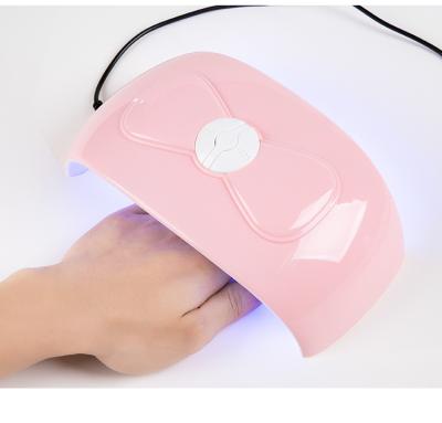 China Nail Art Tools Pink Bow 54W UV LED Gel Nail Curing Light Lamp Acrylic Gel Timer Manicure Quick Cure Nail Dryer for sale