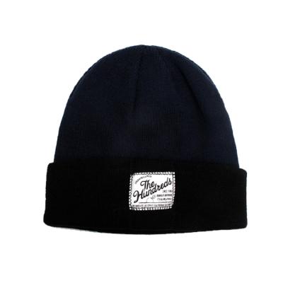 China Custom Black Wool Label Logo Beanie Hats COMMON for sale