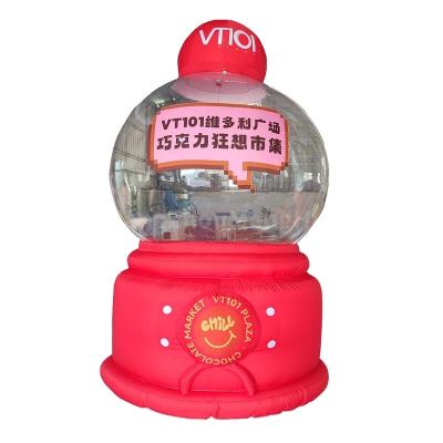 China Advertising Hot Sales Carnival Inflatable Chocolate Theme Gashapon Machine Outdoor New Design Cartoon for Decorations for sale