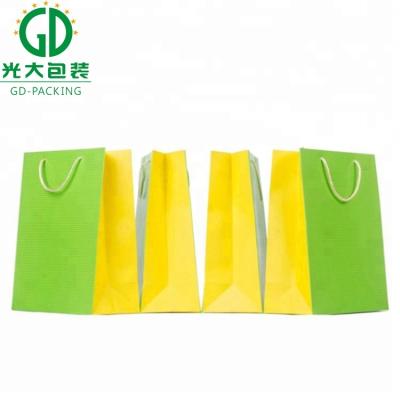 China Recyclable High Quality Low Price Customized Logo Paper Bags For Promotional Clothing for sale