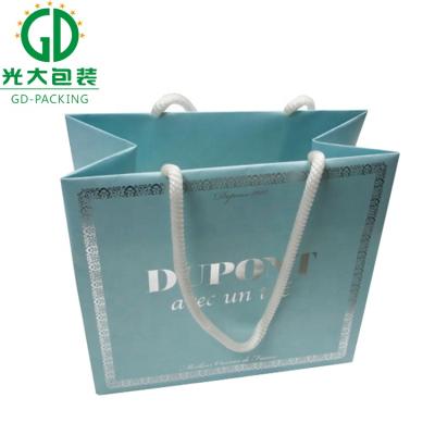 China Recyclable UV Outdoor Handling Paper Shopping Bag for sale