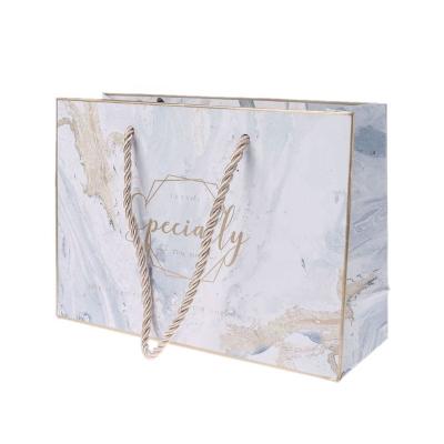 China Christmas Recyclable Drawstring Lowest Price Marble Paper Bag for sale