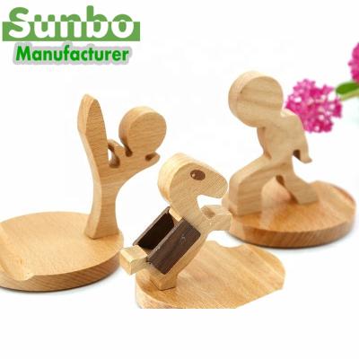 China Lovely cartoon wooden mobile phone wooden base stand for sale