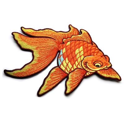 China Custom pattern golden fish flat embroidery patches for women hoodie zu verkaufen