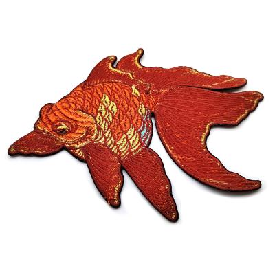 China Custom pattern golden fish flat embroidery patches for women hoodie for sale