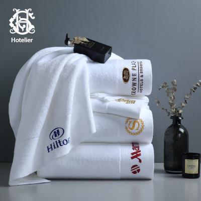 China Hypoallergenic Easy Customize Luxury Five Star Hotel 100% Hypoallergenic White Cotton Dobby Face Hand Bath Towels Set For Hotel Spa With Customized Logo for sale