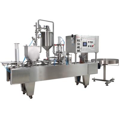 China Food Grade Automatic Chocolate Maker Powder Cup Filling And Sealing Machine for sale