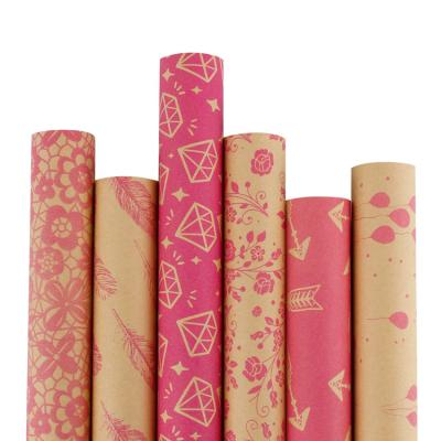 China Waterproof Wholesale Hot Pink Patterns Printed Thick Brown Kraft Gift Wrapping Paper for sale