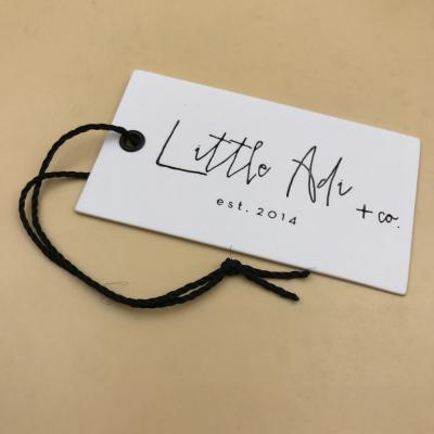 China Recyclable New Design Cardboard Paper Swing Labels Luxury Jeans Hang Tags With Own Logos for sale