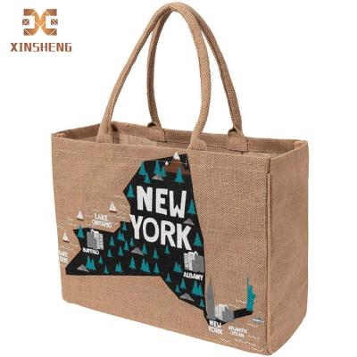 China Wholesalers handled china jute gift bags handle jute packaging bags strand natural handmade jute bags for sale