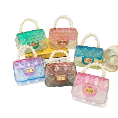 China Vintage Wholesales Candy Colors PVC Clear Women Purse Chain Mini Small Jelly Crossbody Handbags For Kids for sale