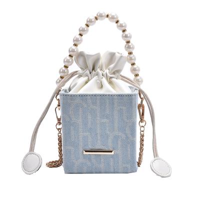 China 2021 Fashion Hot Selling Ladies Handbags Wholesale Mini Purses Popular Small Chain Cross - Body Pearl Shoulder Bags For Women for sale