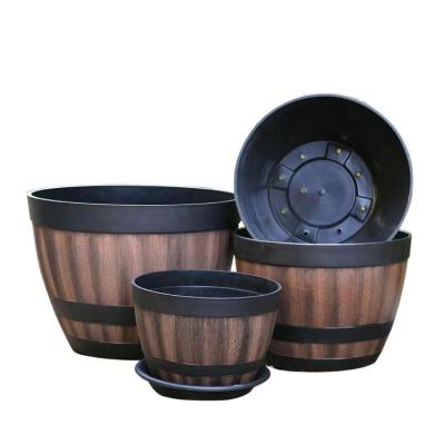 China Hot Selling CLASSIC European Vintage Imitation Resin Wine Barrels Thickened Plastic Flower Pots for sale