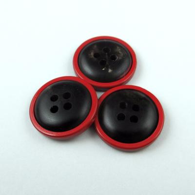 China Premium Natural Material Dry Cleaning 4 Holes Horn Button With Red Rim for sale