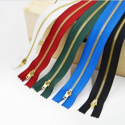 China Sustainable High Quality Cheap Zippers 4# Gold Metal Zipper for sale