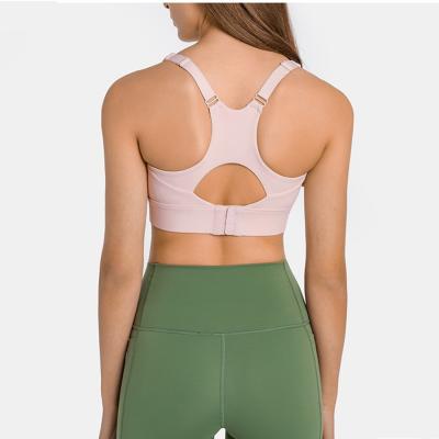 China Breathable High Quality Running Sports Fitness Tops Women Sports Bra Nude Plain Padded Yoga Training Bras for sale