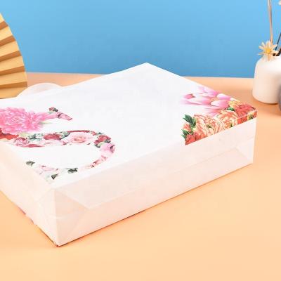 China Shock Resistance Fashion Laminated Packaging PP Non Woven Bag Wedding Bag Sugar Shopping Bag Thick Layer Covered Nonwoven Handbag for sale