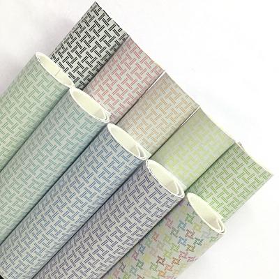 China Wrinkle Resistant Faux Leather Vinyl Checker Printed Colorful Printed Synthetic Leather DIY Crafts 1MM Thickness for sale