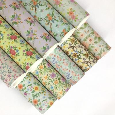 China Wholesale Wrinkle Resistant Faux Leather Flower Printed Colorful Printed Vinyl Synthetic DIY Leather Crafts for sale