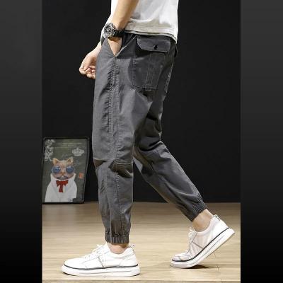 China Anti-pilling Summer Thin Casual Nine Point Pants Men's Loose Plus Size Jumpsuits for sale