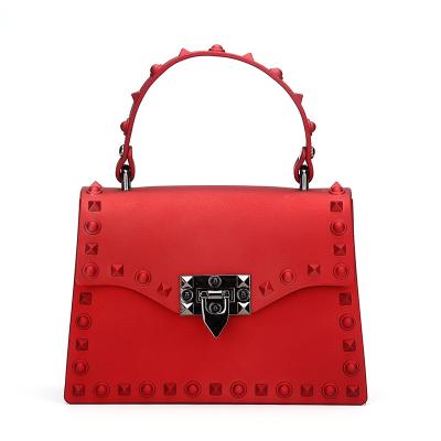 China 2021 new female portable bag fashion small jelly fasion latest bag can be customized with color rivets for sale