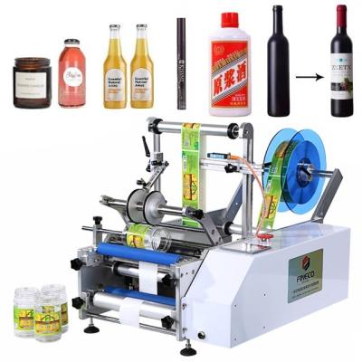 China FK603 Semi-automatic Manual Glass Round Bottle Labeling Machine for Packaging in Cases for sale