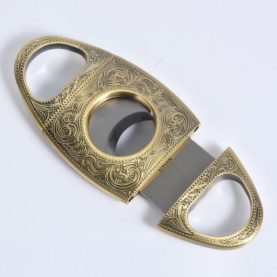 China 95*45mm Minimalist Luxury Custom Gold Carving Pattern Cigar Cutter Knife For Portable Travel for sale