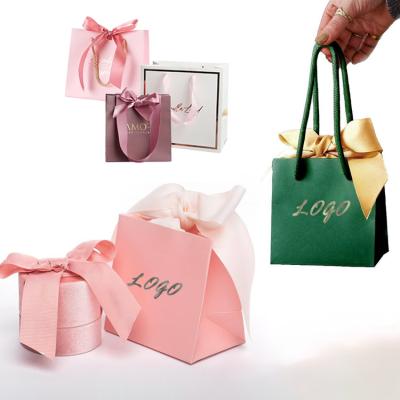 China Custom Recyclable Custom Logo Luxury Boutique Small Medium Wedding Marble Design Jewelry Shopping Paper Gift Retail Bag for sale