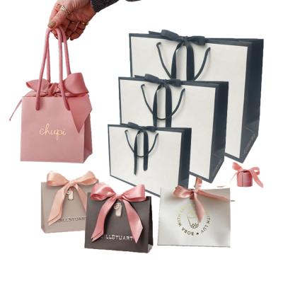 China Recyclable Wholesale Cheap Black Jewelry Gift Shopping Retail Custom Printed Famous Brand Luxury Paper Tote Bags for sale