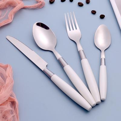 China Sustainable Western Nordic Style Wedding Used Siliverware White Grip Handle Cutlery Stainless Steel Plastic Flatware Sets for sale