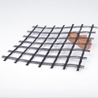 China Fiberglass Asphalt Reinforcement Geogrid Machine Mesh High Tensile Strength for sale