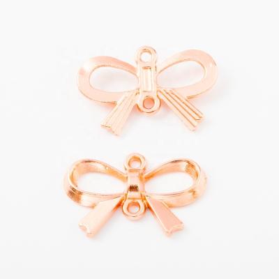 China Trendy Hot Selling Alloy Rose Gold Bow Tie Pendant Charms Pendant For Fashion Jewelry for sale