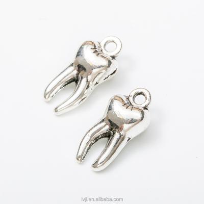 China Trendy Wholesale Zinc Alloy Material Fashion Jewelry Antique Silver Tooth Charms for sale