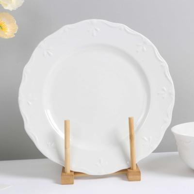 China Irregular Side White Embossing Ceramic Dishes Ceramic Edge Household Restaurant Flat Plates for sale