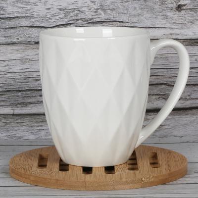 China Viable Embossed Ceramic Mugs Refine White Coffee Mugs Tea Cups Porcelain High Quality Coffee Mugs for sale